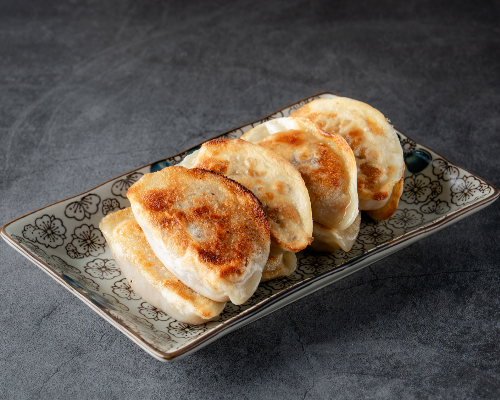 PAN-FRIED PORK DUMPLINGS一品锅贴