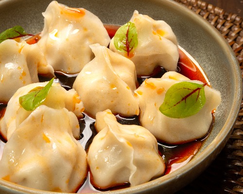 110. Boiled Pork & Wombok Dumplings served with Angie's Signature Spicy Sauce 猪肉红油水饺 (8pcs)