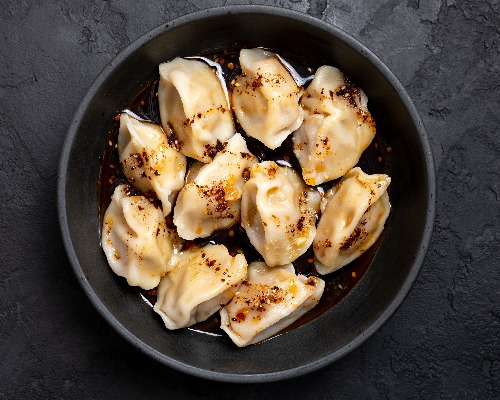 Dumplings in Sweet Soy Chilli sauce (钟水饺）