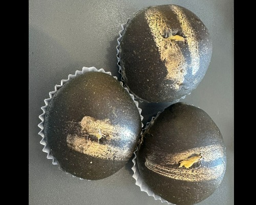 10. Black Gold Egg Yolk Bun 黄金咸蛋流沙包