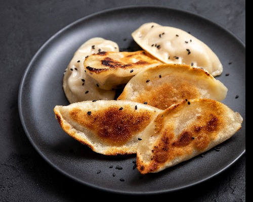 Pan-fried Pork Dumpling (锅贴）
