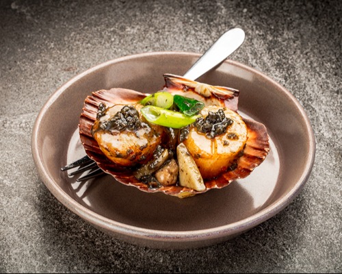 E08. Sauteed Scallops with Black Truffles Sauce